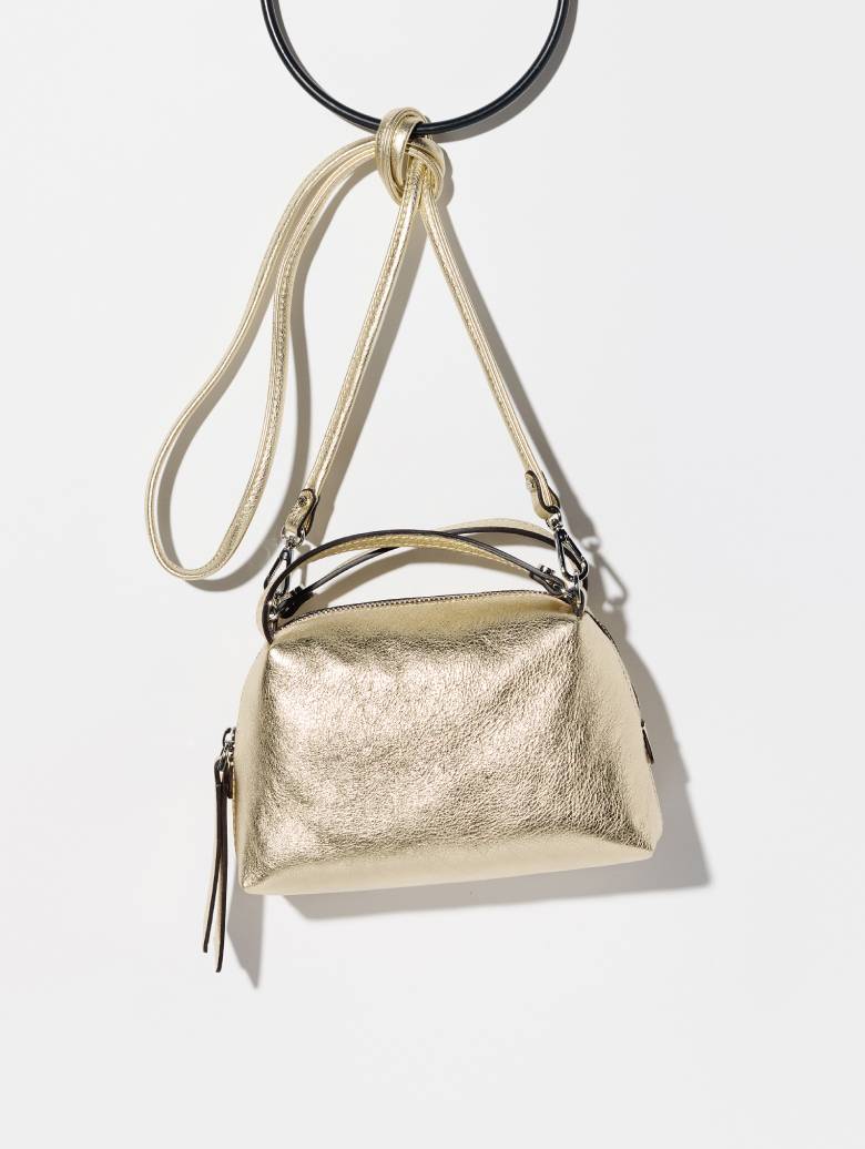 〈ジャンニ キアリーニ〉のメタリックバッグ